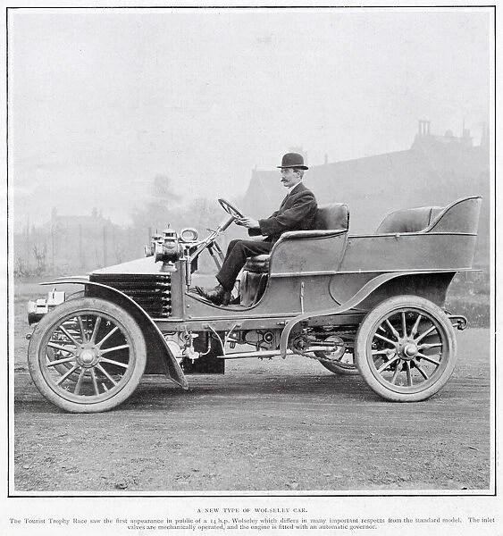 A man driving the new four-seater Wolseley motor car, speed of 30 m. h. Date: 1905