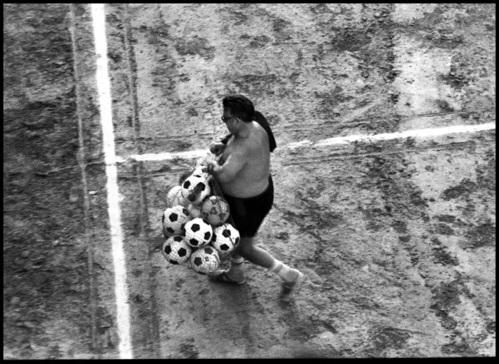 Framed Print : Man with footballs on training pitch, Spain Framed Print : Man with footballs on training pitch, Spain