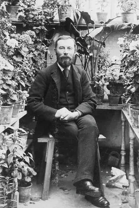 Framed Print : Man in Greenhouse Framed Print : Man in Greenhouse