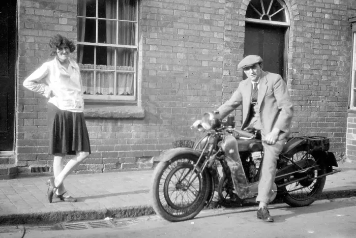 Framed Print : Man on a motorcycle with girlfriend Framed Print : Man on a motorcycle with girlfriend