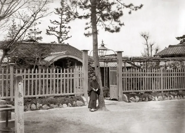 Framed Print : Man outside house China, circa 1880s Framed Print : Man outside house China, circa 1880s