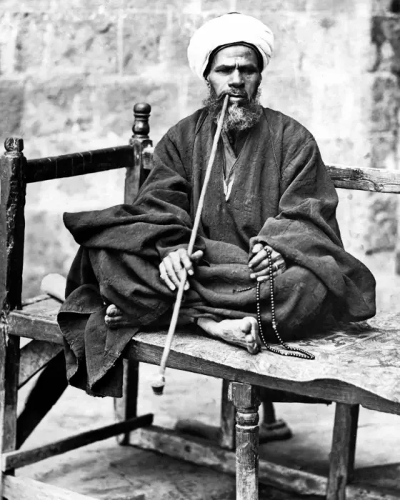 Framed Print : Man with pipe and beads, Egypt Framed Print : Man with pipe and beads, Egypt