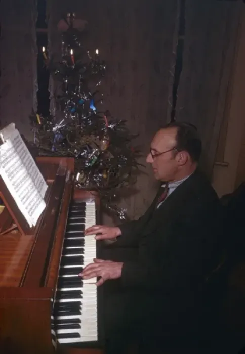 Framed Print : Man playing piano at Christmas Framed Print : Man playing piano at Christmas