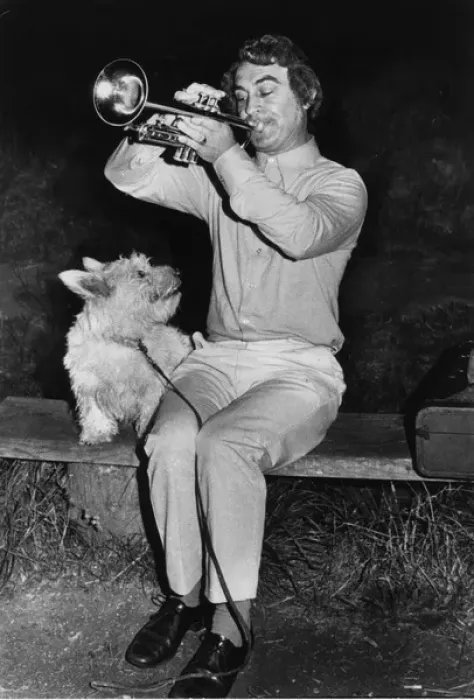 Framed Print : Man playing trumpet, dog listening Framed Print : Man playing trumpet, dog listening