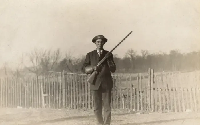 Framed Print : Man posing with rifle Framed Print : Man posing with rifle