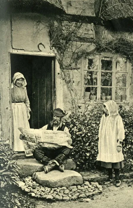 Framed Print : Man reading newspaper outside his cottage, Shropshire Framed Print : Man reading newspaper outside his cottage, Shropshire