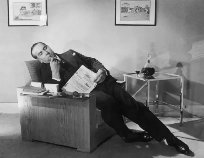 Framed Print : Man Relaxing with Pipe