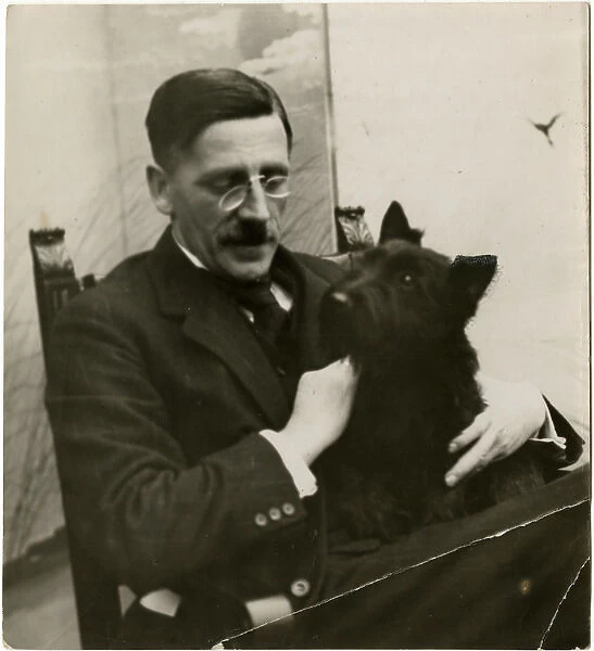 Man with Scots terrier