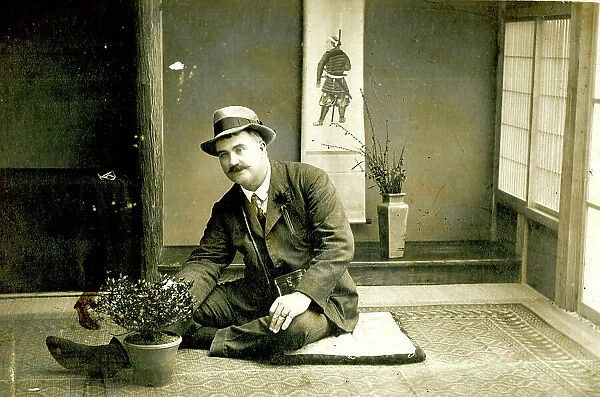 Man seated on the floor in a Japanese house