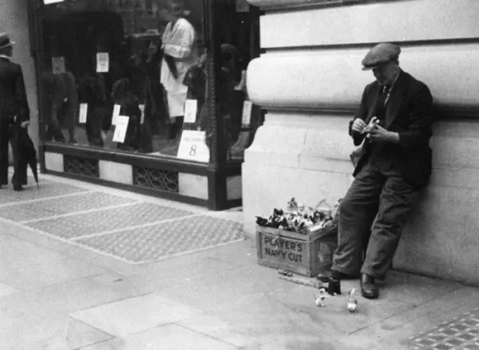 Framed Print : Man selling clockwork toys on street Framed Print : Man selling clockwork toys on street