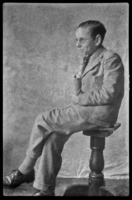 Framed Print : Man sitting on a stool Framed Print : Man sitting on a stool