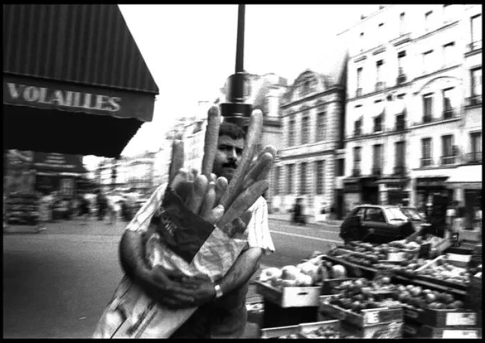 Framed Print : Man in street with baguettes, Paris, France Framed Print : Man in street with baguettes, Paris, France