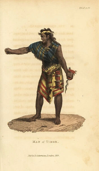 Man of Timor in cotton shawl and skirt, holding
