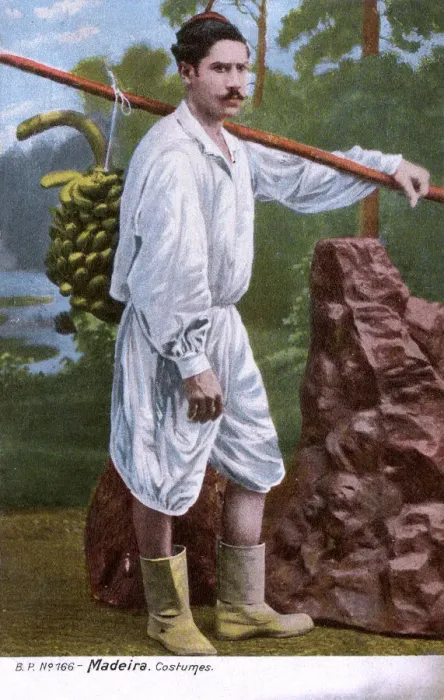 Framed Print : Man in traditional costume, carrying bananas, Madeira Framed Print : Man in traditional costume, carrying bananas, Madeira
