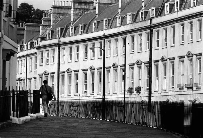Framed Print : A man walks briskly along The Paragon in the centre of Bath Framed Print : A man walks briskly along The Paragon in the centre of Bath