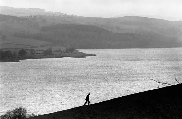 Framed Print : A man walks up a hill above Bala Lake, Gwynedd. North Wales Framed Print : A man walks up a hill above Bala Lake, Gwynedd. North Wales