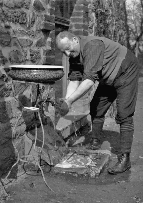 Framed Print : Man washing hands after gardening Framed Print : Man washing hands after gardening