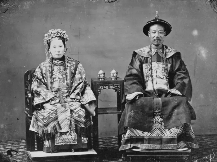 Framed Print : Man and woman seated, China Framed Print : Man and woman seated, China