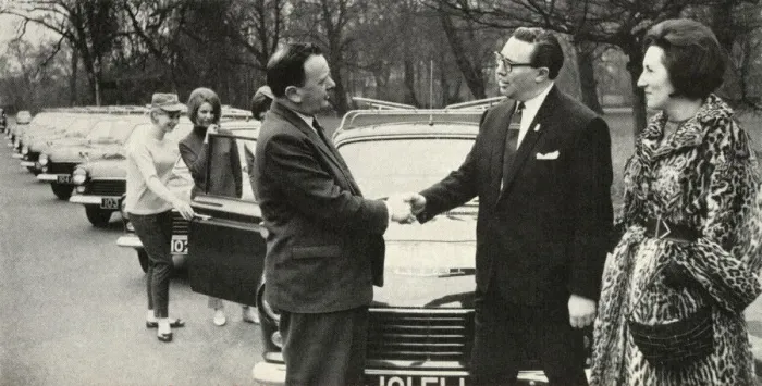 Framed Print : Managing Director of Welbeck Minicabs accepts new fleet cars Framed Print : Managing Director of Welbeck Minicabs accepts new fleet cars