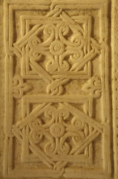 Marble slab decorated with geometric designs and filigree. C