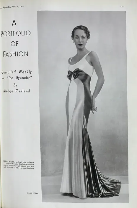 Framed Print : Margaret Rawlings, actress, (1906-1996) fashion studio portrait. With description, White, pale blue and dark blue cire satin combine to make this lovely evening gown by Norman Hartnell Framed Print : Margaret Rawlings, actress, (1906-1996) fashion studio portrait. With description, White, pale blue and dark blue cire satin combine to make this lovely evening gown by Norman Hartnell