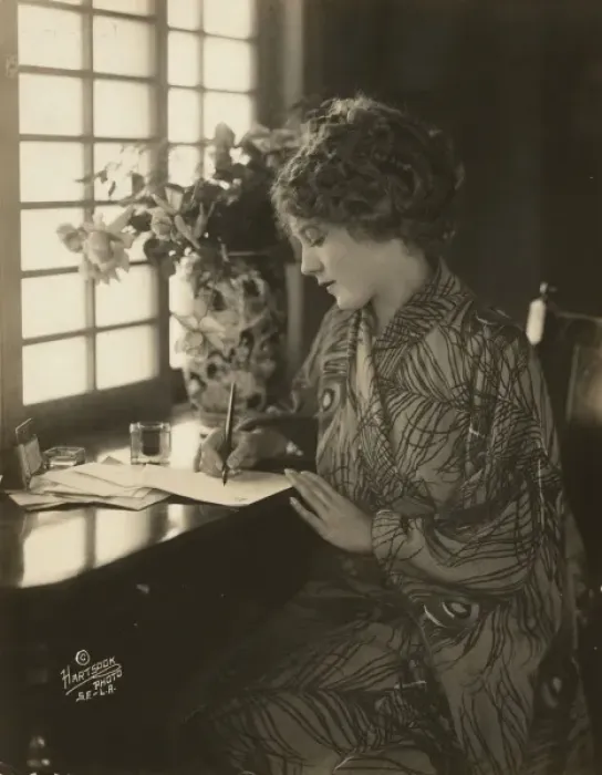 Framed Print : Mary Pickford, wearing a kimono, writing at a desk Framed Print : Mary Pickford, wearing a kimono, writing at a desk
