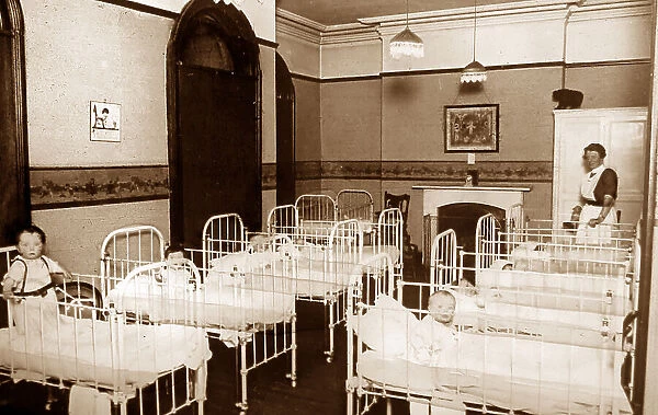 A maternity hospital ward, hand coloured photo