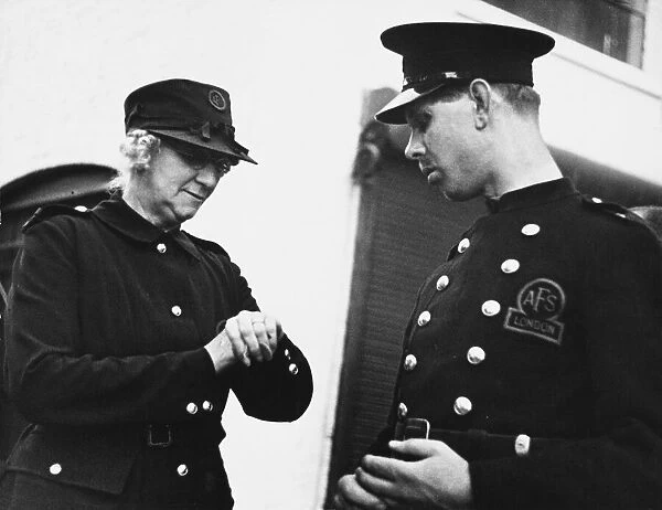 Members of the Auxiliary Fire Service in London during World War II Date: 1939-1945