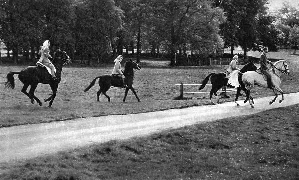 Members of the Royal Family on horseback