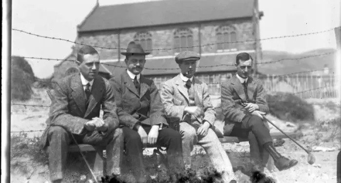 Framed Print : Four men on a bench at golf club Framed Print : Four men on a bench at golf club
