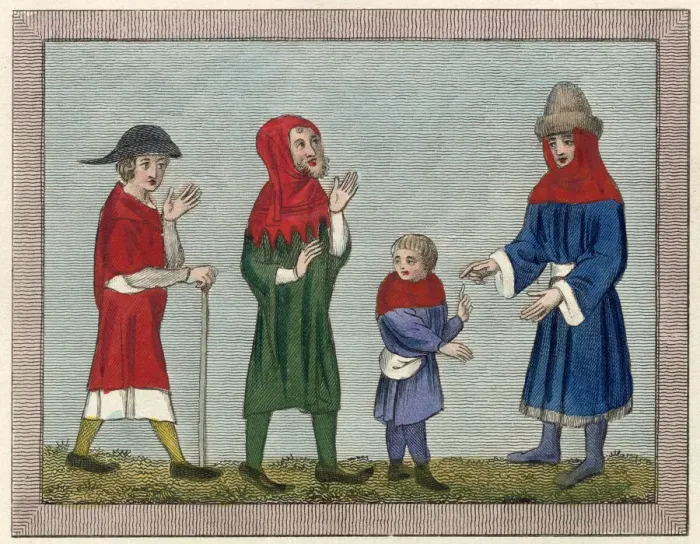 Framed Print : Three men and a boy dressed for travel; one wears a hood Date: 14th century Framed Print : Three men and a boy dressed for travel; one wears a hood Date: 14th century