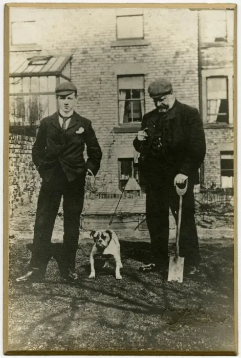 Framed Print : Two men with bulldog in a back garden Framed Print : Two men with bulldog in a back garden
