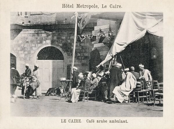 Men drinking coffee at the Metropolitan Hotel, Cairo