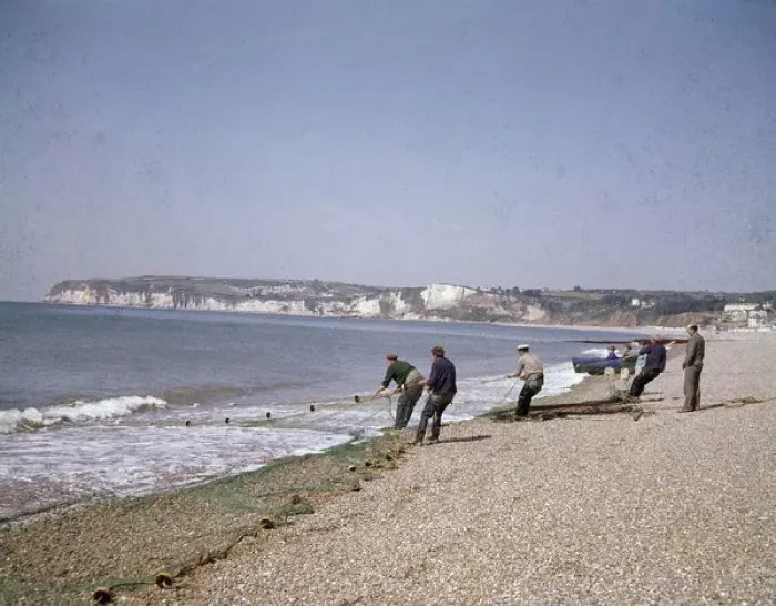 Framed Print : Men with fishing nets at Seaton, Devon Framed Print : Men with fishing nets at Seaton, Devon