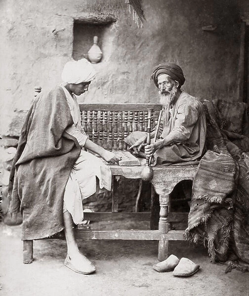 Men with hookah pipe playing board game, Egypt, c. 1880 s