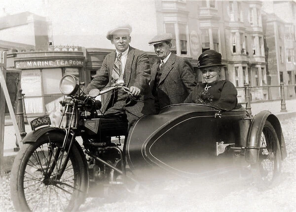 Men and lady on a 1914  /  15 Enfield motorcyle & sidecar