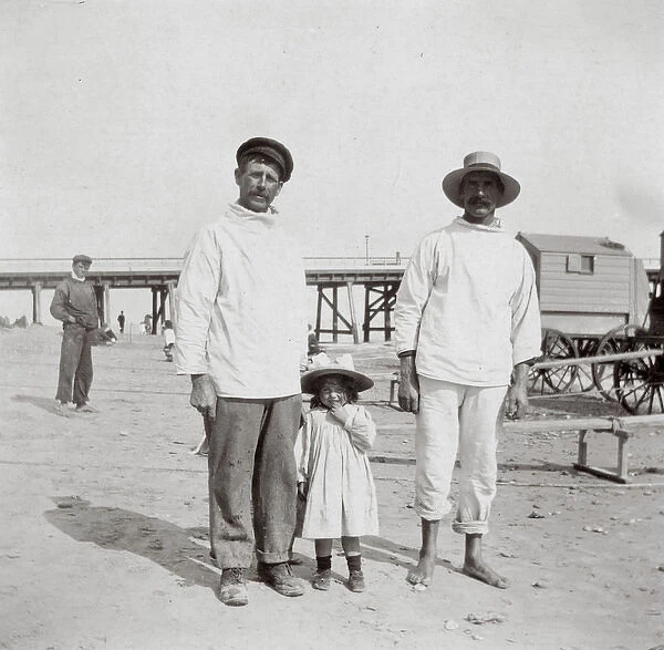 Two men and a little girl, Southwold, Suffolk
