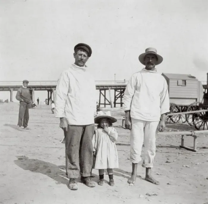 Framed Print : Two men and a little girl, Southwold, Suffolk Framed Print : Two men and a little girl, Southwold, Suffolk