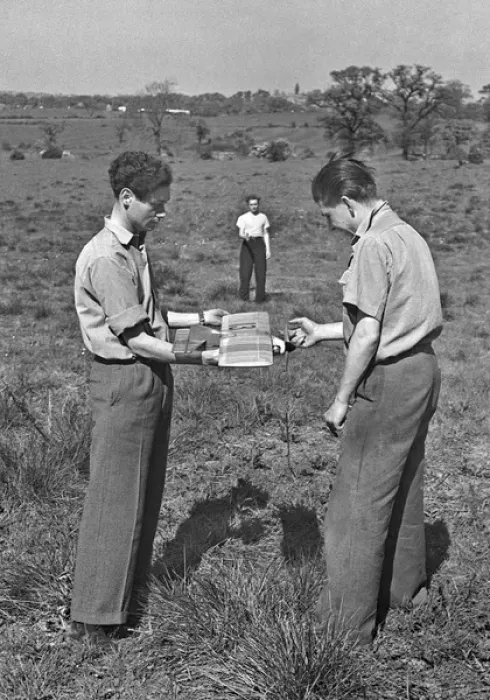 Framed Print : Three men with model plane in a field Framed Print : Three men with model plane in a field