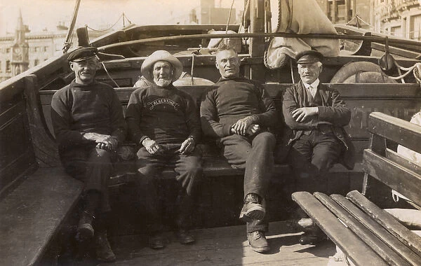 Four men on New Albertine, Hastings