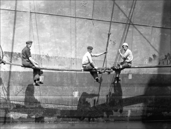 Framed Print : Men painting the side of a large boat Framed Print : Men painting the side of a large boat