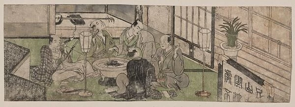 Five men relaxing around a hibachi