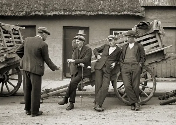 Framed Print : Men resting at the side of a cart Framed Print : Men resting at the side of a cart