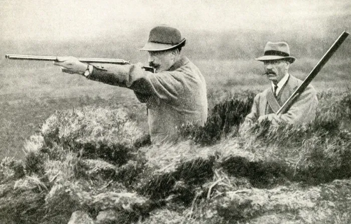 Framed Print : Two men shooting grouse from butts on an English moor Framed Print : Two men shooting grouse from butts on an English moor