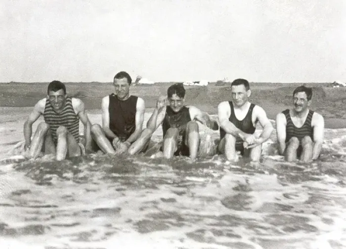 Framed Print : Five men sitting in the sea in bathing suits Framed Print : Five men sitting in the sea in bathing suits