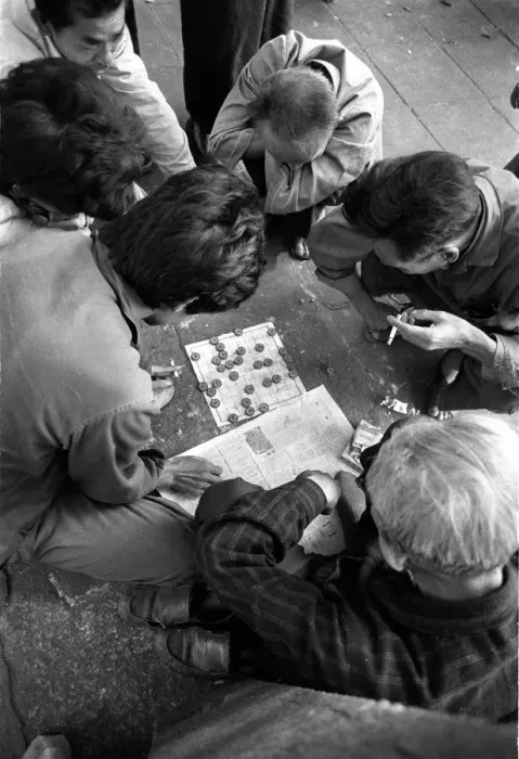 Framed Print : Men smoke and play a game of checkers in Canton, China Framed Print : Men smoke and play a game of checkers in Canton, China