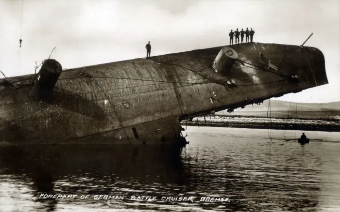 Framed Print : Men stand on forepart of part-submerged German Battlecruiser Framed Print : Men stand on forepart of part-submerged German Battlecruiser
