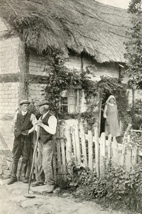 Framed Print : Men and woman outside a thatched cottage, Herefordshire Framed Print : Men and woman outside a thatched cottage, Herefordshire