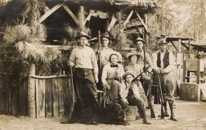 Framed Print : Men and women with rifles, Lumbermans Rest, USA