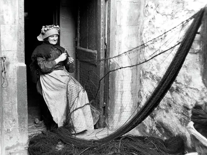 Framed Print : Mending fishing nets early 1900s Framed Print : Mending fishing nets early 1900s